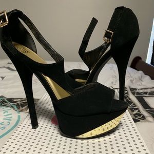 Suede black and gold stilettos